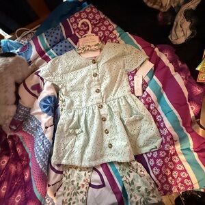 Little Lass Light Green Eyelet Top with Floral Capris and matching headband.